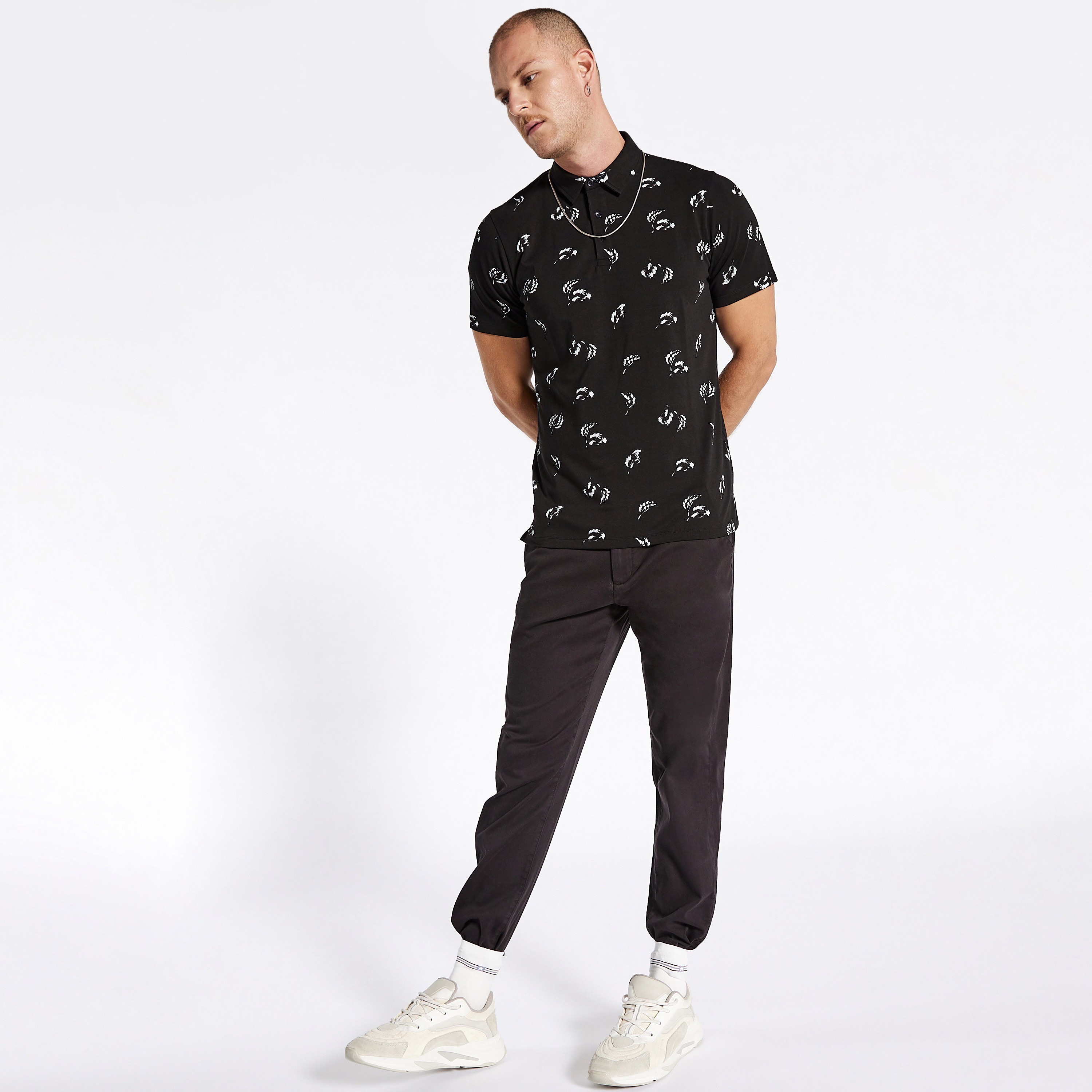 تيشيرت بولو بأكمام قصيرة وزر إغلاق وطبعات-men-clothing-tshirtsandpolos-polos-image-2