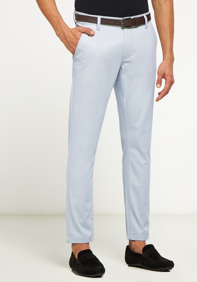 Buy Men's Solid Full Length Chinos with Button Closure and Pockets ...