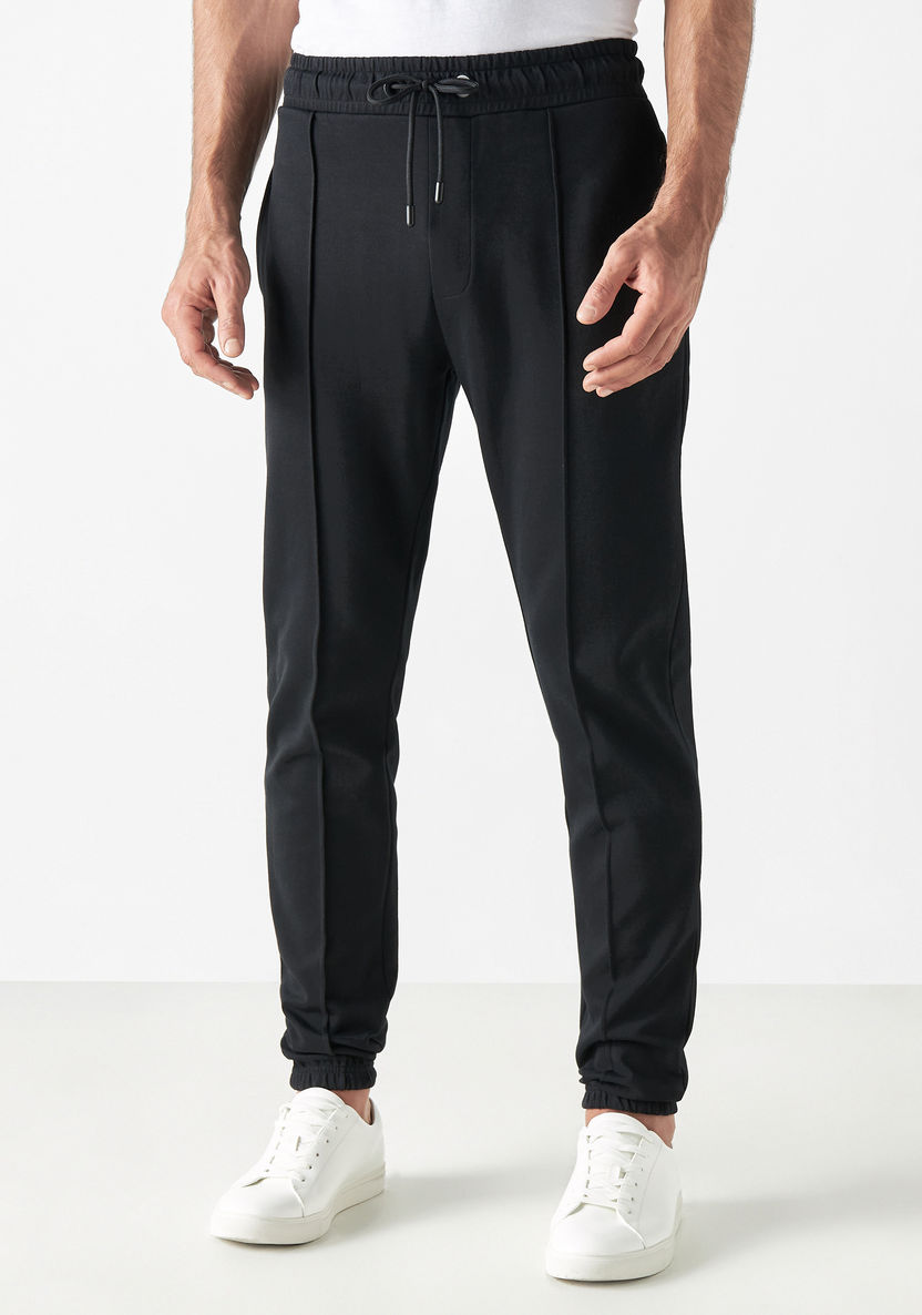 Buy Iconic Solid Joggers with Drawstring Closure and Pockets | Splash UAE