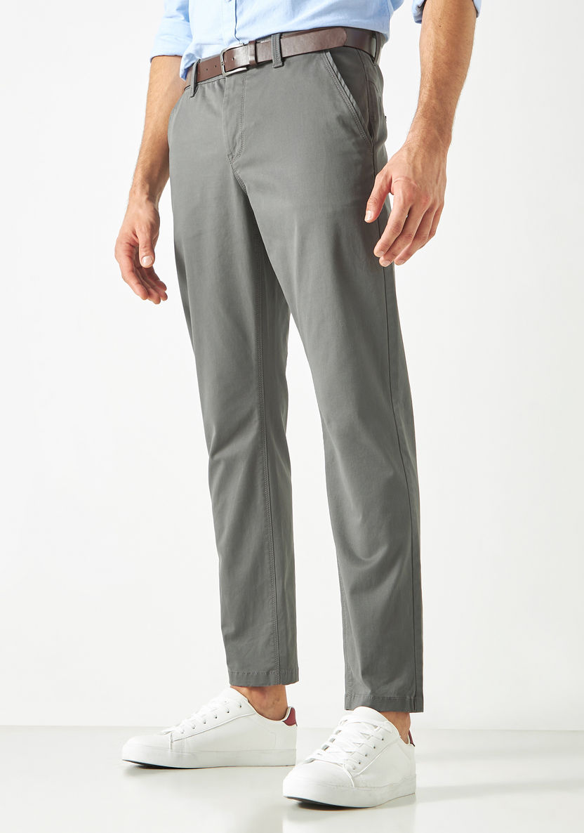 Buy Men's Regular Fit Solid Belted Chinos Online | Centrepoint KSA