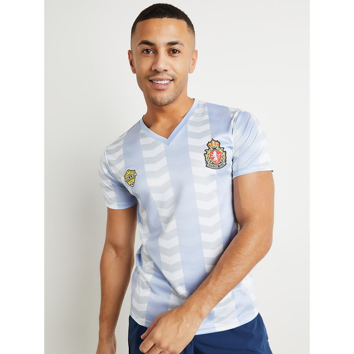 تيشيرت علي مخطط لكرة القدم من ستايلي-men-clothing-sportswearandactivewear-tshirtsandpolos-image-1