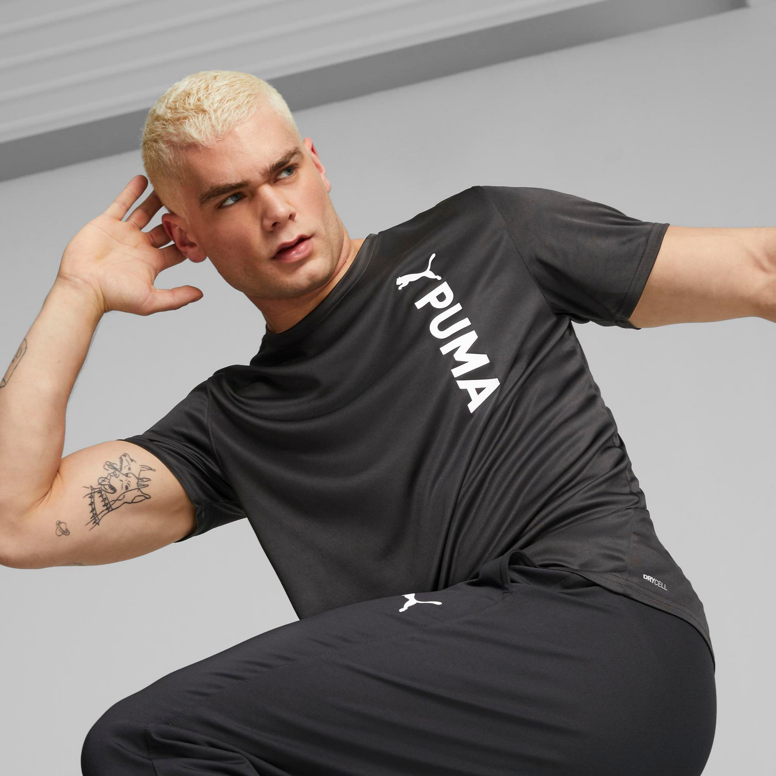 تي شيرت ذو تدريب من بوما مع شعار بولي للرجال | 523843-men-clothing-sportswearandactivewear-tshirtsandpolos-image-1