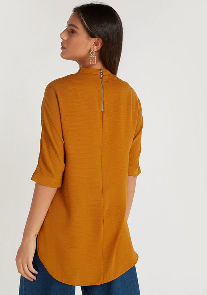 Textured Top with Zipper Back and High Neck