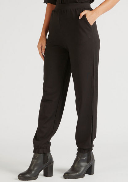 Solid Mid-Rise Joggers with Elasticised Waistband and Pockets