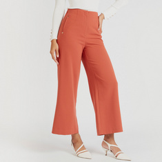 Solid Mid-Rise Trousers with Pockets and Zip Closure