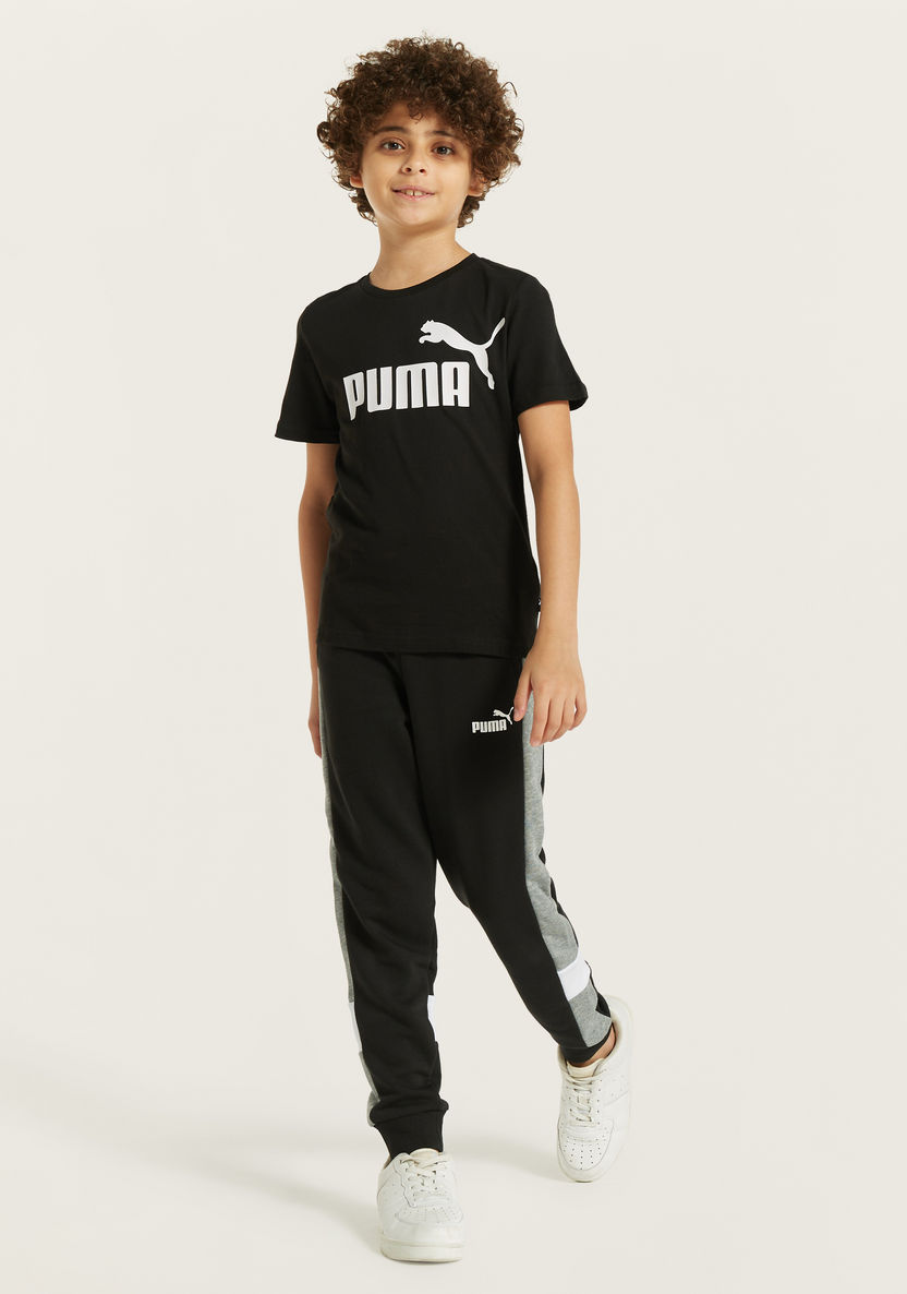 PUMA Logo Print T-shirt with Short Sleeves and Round Neck-Tops-image-1