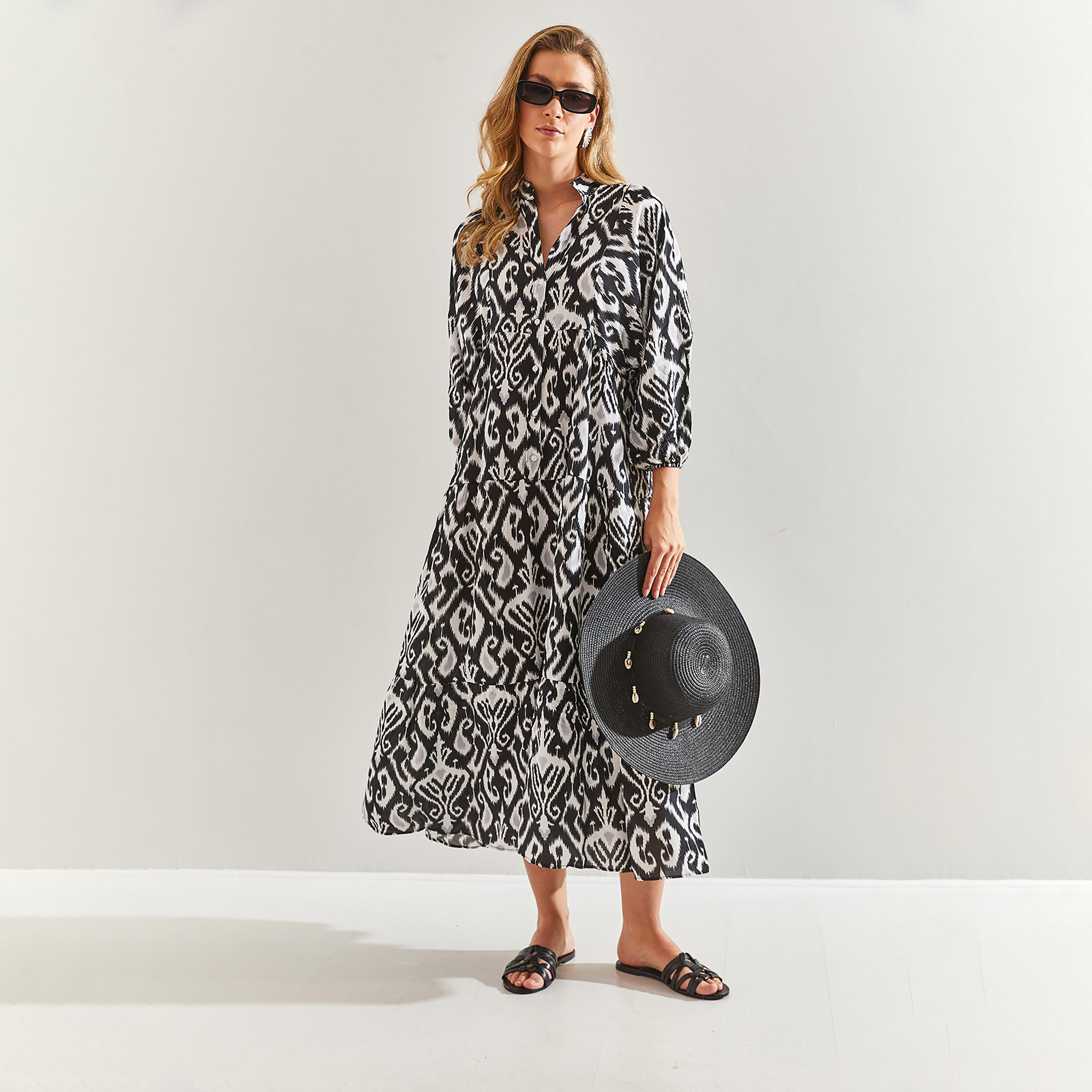 فستان ميدي نسائي بطبقات وياقة ماندارين وطبعة إيكات بيزلي سوداء من بيانكو لوتشي-women-clothing-dresses-image-4