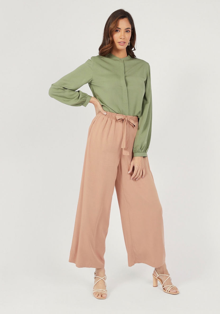 Solid Palazzo Pants with Pockets and Tie-Up Detail-Pants-image-1