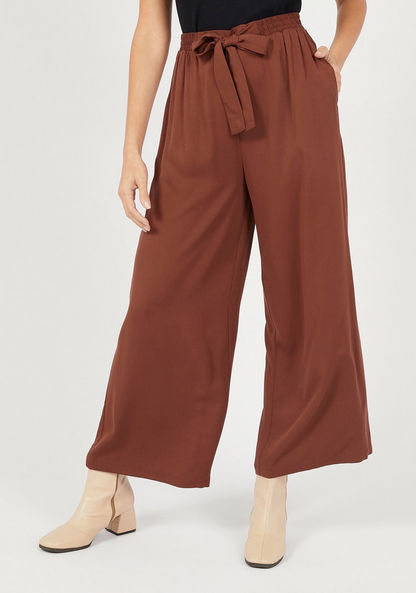 Solid Palazzo Pants with Pockets and Tie-Up Detail-Pants-image-0