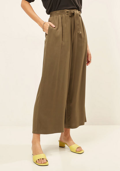 Solid Mid-Rise Palazzo Pants with Tie-Up Detail and Pockets-Pants-image-0
