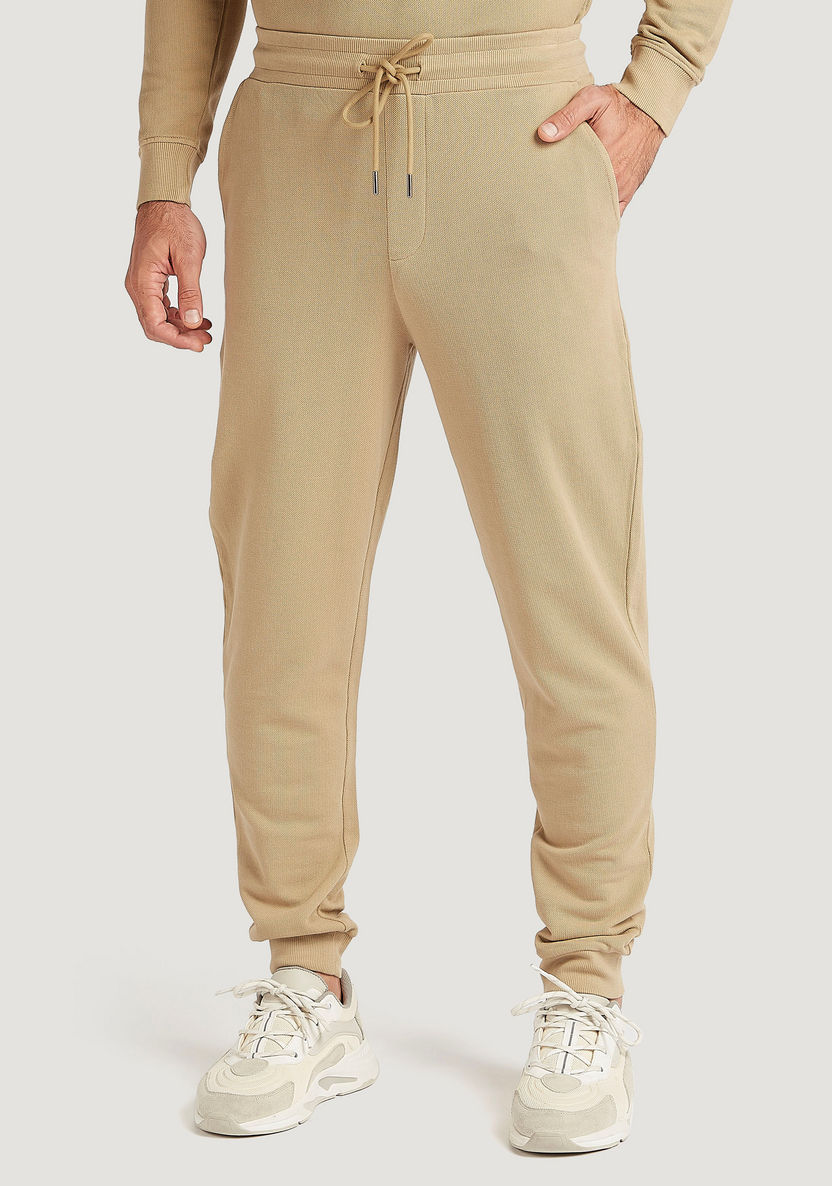 Solid Flexi Waist Joggers with Drawstring Closure-Joggers-image-0