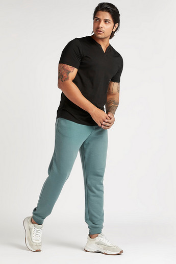 Sustainable Solid T-shirt with Henley Neck and Short Sleeves