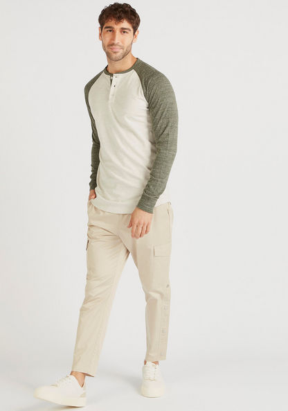 Solid T-shirt with Henley Neck and Long Raglan Sleeves