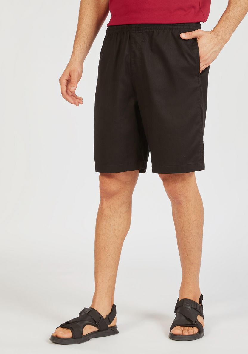 Solid Shorts with Elasticated Waistband and Pockets-Shorts-image-0