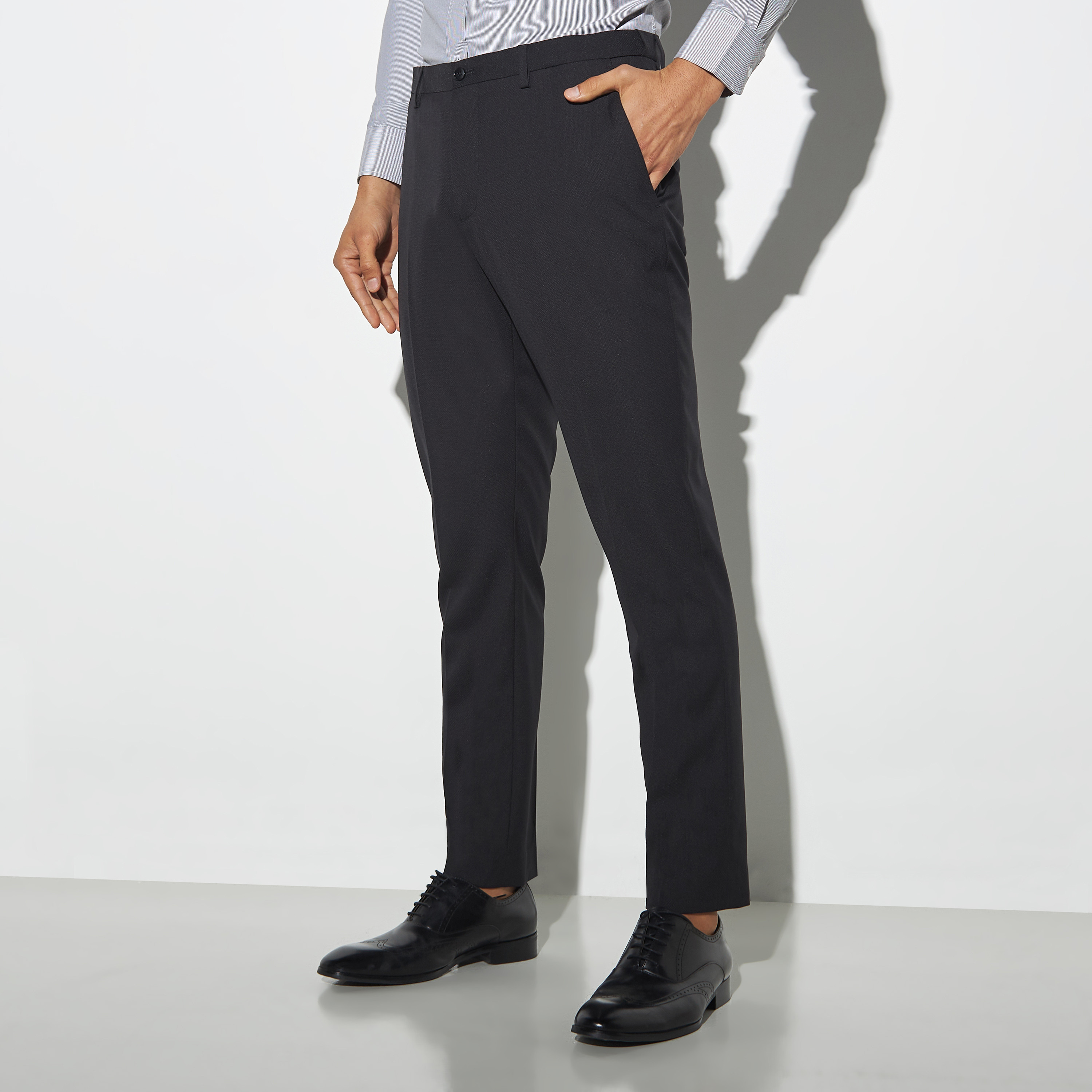 Buy Men's Solid Full Length Formal Trousers Online | Centrepoint Qatar