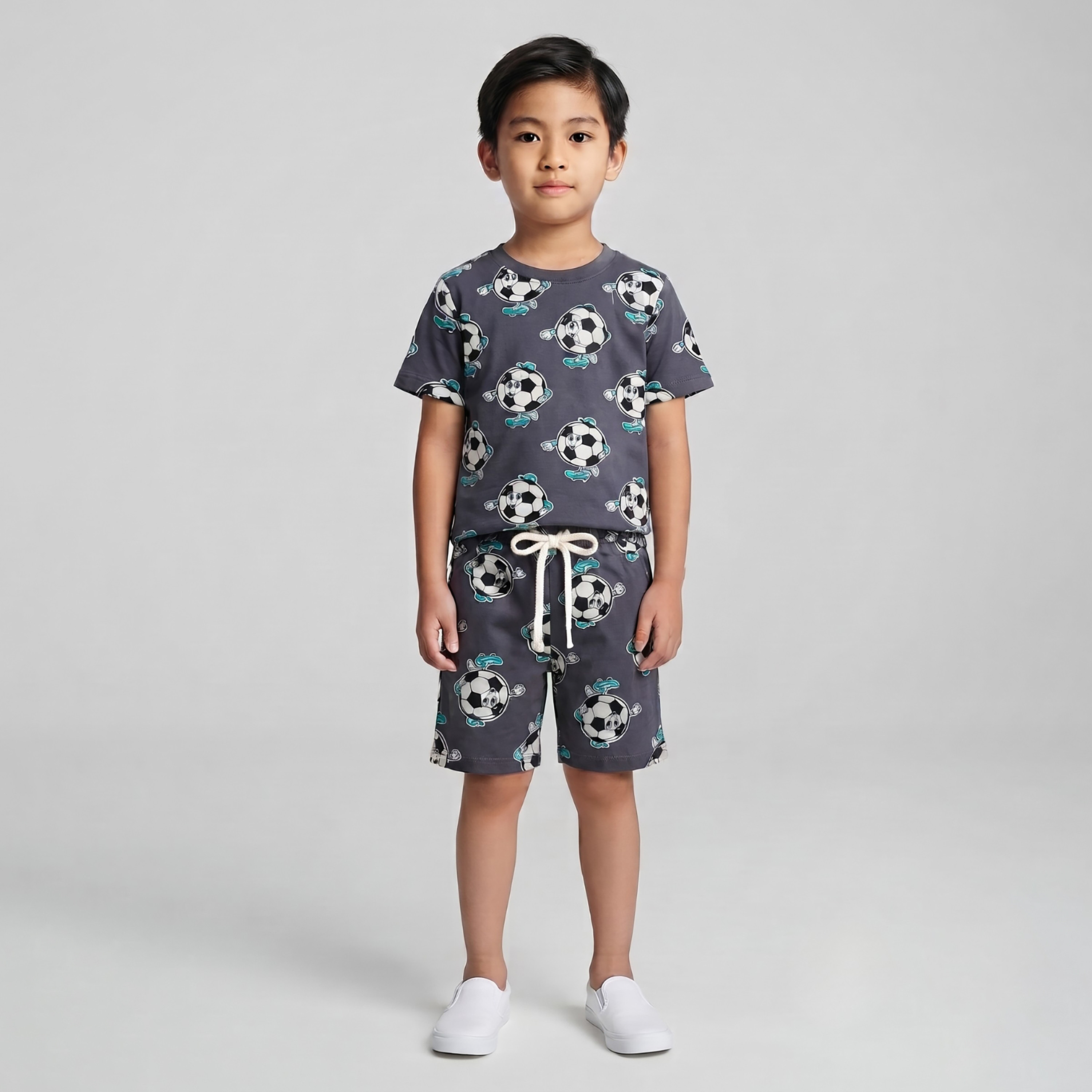 طقم متناسق تيشرت بأكمام قصيرة وبنطال بيجامة بطبعة كرة القدم من بيبي كلو-boys-clothing-setsandcoords-image-1
