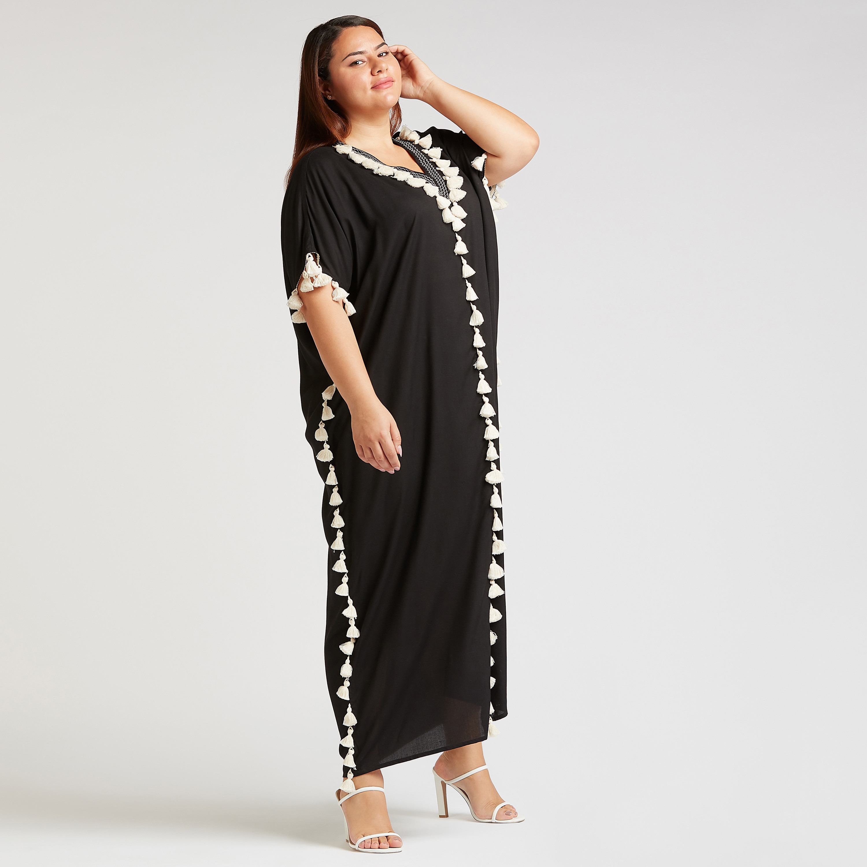 Buy Women s Solid Maxi Shift Dress with V neck and Tassels Online Centrepoint Bahrain