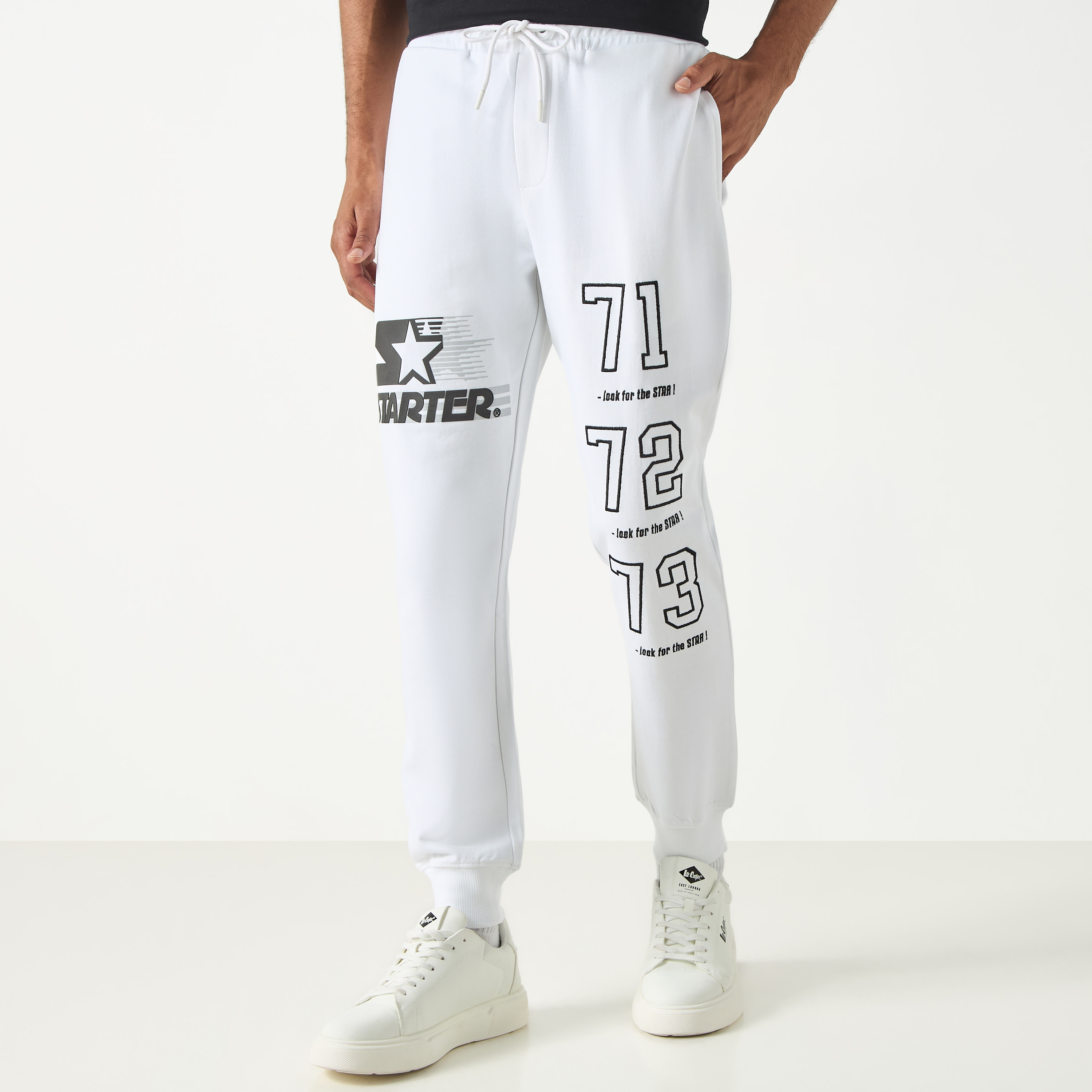 Buy Starter Logo Embossed Flexi Waist Relaxed Fit Joggers with Drawstring Closure Splash UAE