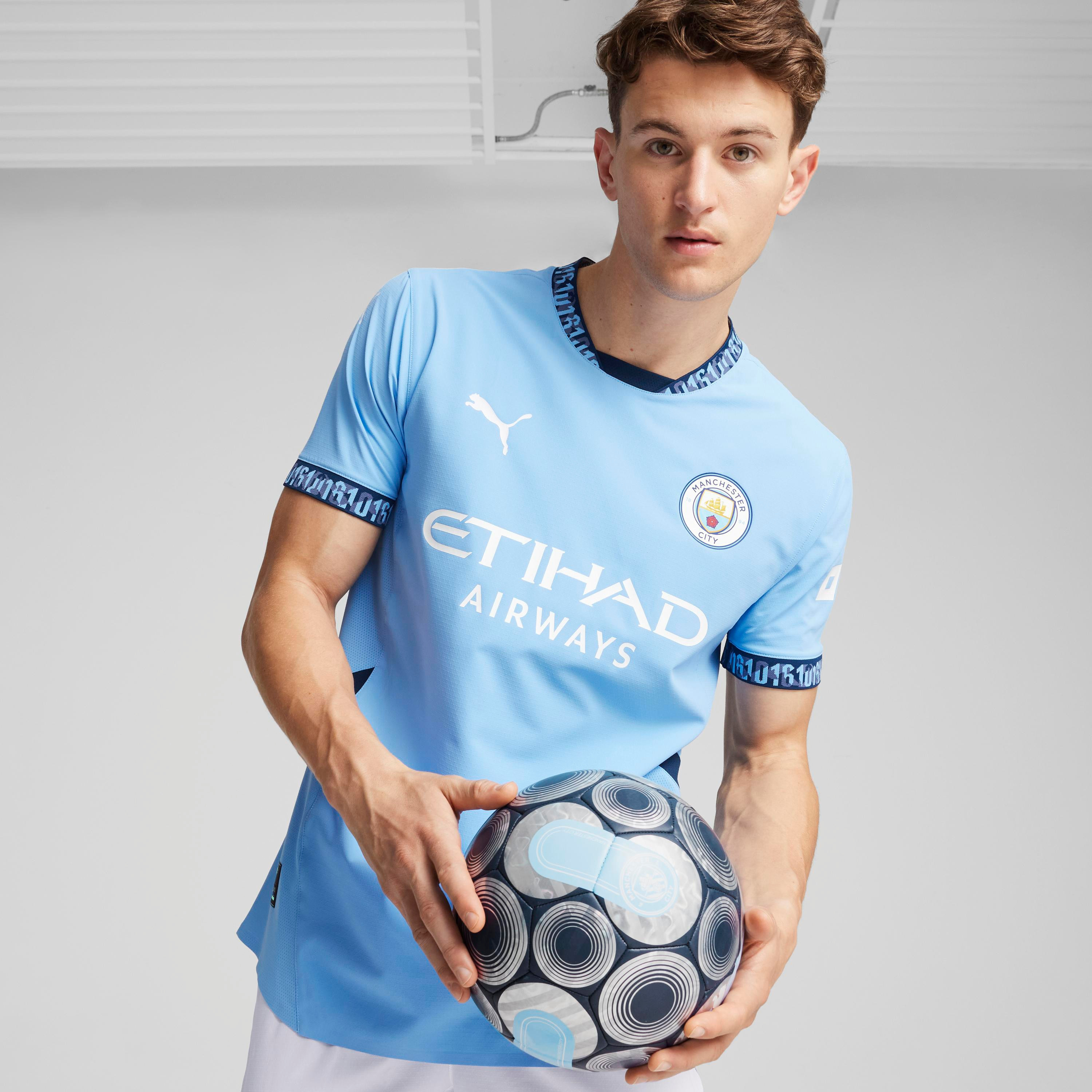 Puma Men's Manchester City FC Home Authentic Jersey Team T-Shirt 77505001 | OE-men-clothing-sportswearandactivewear-tshirtsandpolos-image-1