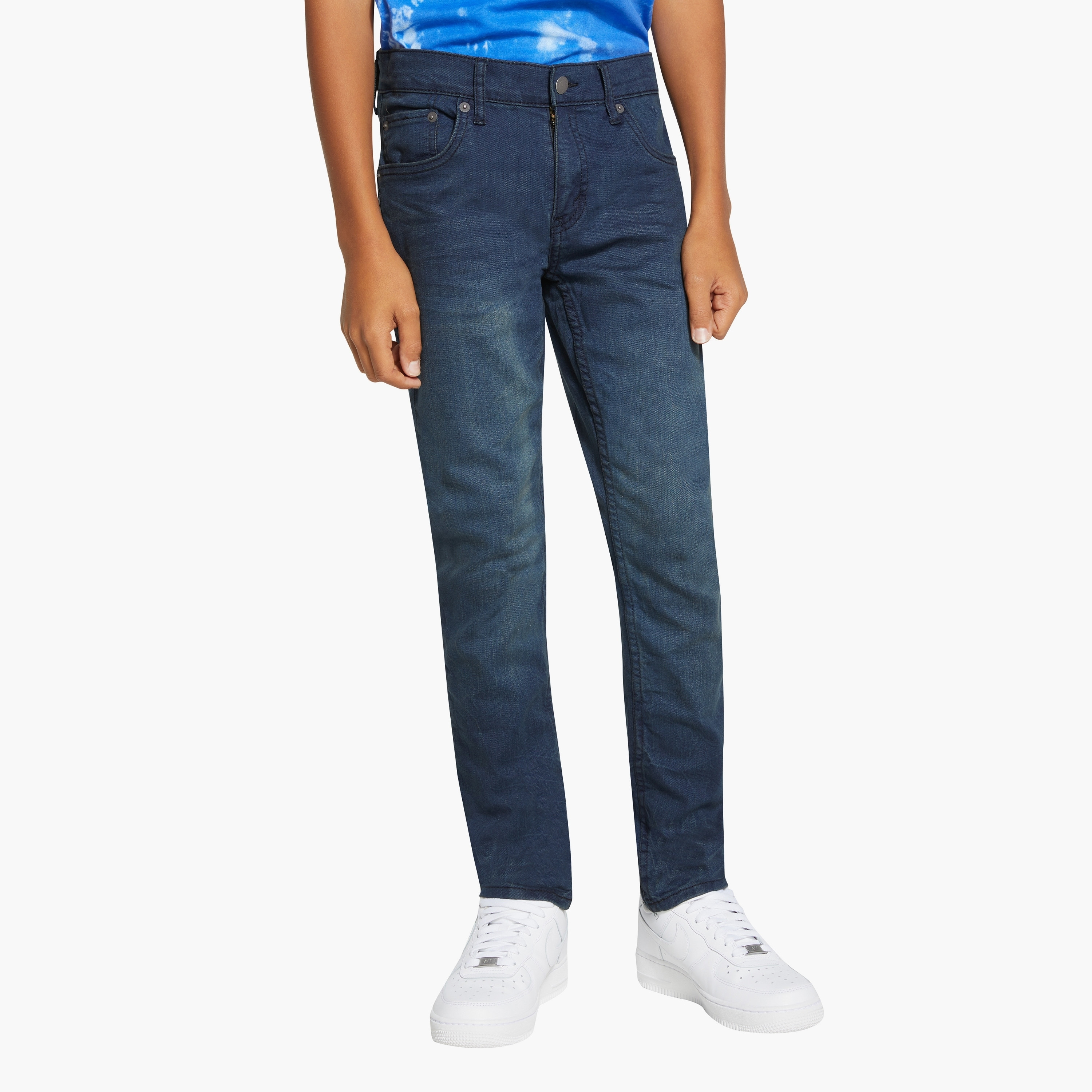 The perfect addition to your toddler boy's casual wardrobe. Designed with meticulous attention to detail, these jeans offer a sleek and stylish look. The button closures not only add a touch of sophistication but also ensure a secure fit. Made with utmost comfort in mind, these jeans are gentle on your little one's delicate skin. The adjustable waist feature allows for a customized fit, ensuring maximum comfort throughout the day. Upgrade your toddler's style game with these trendy and comfortable jeans that are sure to make a statement.-boys-clothing-bottoms-jeans-image-5