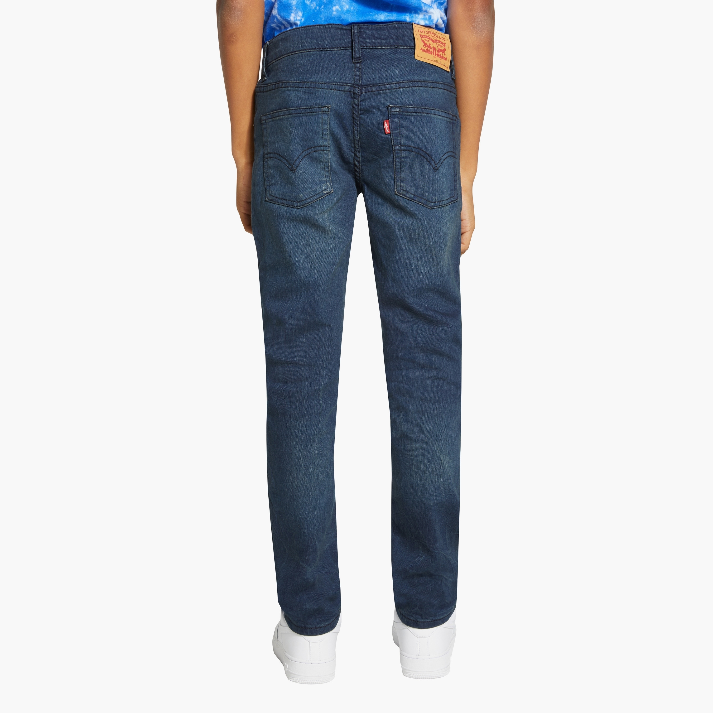 The perfect addition to your toddler boy's casual wardrobe. Designed with meticulous attention to detail, these jeans offer a sleek and stylish look. The button closures not only add a touch of sophistication but also ensure a secure fit. Made with utmost comfort in mind, these jeans are gentle on your little one's delicate skin. The adjustable waist feature allows for a customized fit, ensuring maximum comfort throughout the day. Upgrade your toddler's style game with these trendy and comfortable jeans that are sure to make a statement.-boys-clothing-bottoms-jeans-image-4