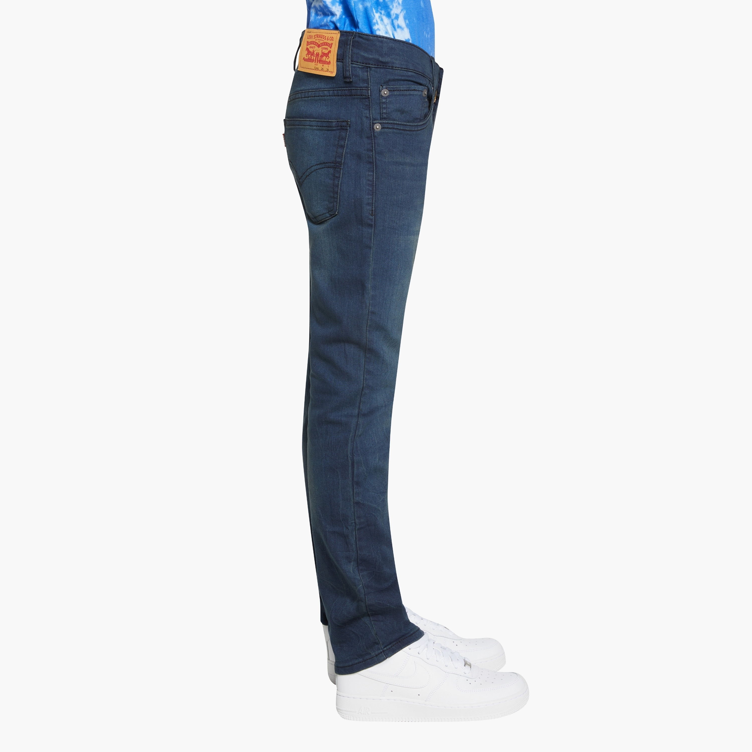 The perfect addition to your toddler boy's casual wardrobe. Designed with meticulous attention to detail, these jeans offer a sleek and stylish look. The button closures not only add a touch of sophistication but also ensure a secure fit. Made with utmost comfort in mind, these jeans are gentle on your little one's delicate skin. The adjustable waist feature allows for a customized fit, ensuring maximum comfort throughout the day. Upgrade your toddler's style game with these trendy and comfortable jeans that are sure to make a statement.-boys-clothing-bottoms-jeans-image-3