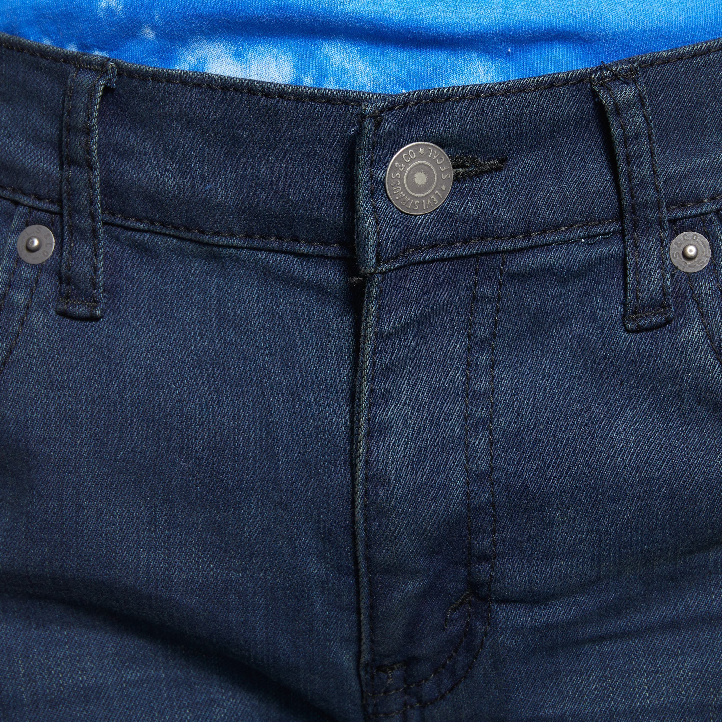 The perfect addition to your toddler boy's casual wardrobe. Designed with meticulous attention to detail, these jeans offer a sleek and stylish look. The button closures not only add a touch of sophistication but also ensure a secure fit. Made with utmost comfort in mind, these jeans are gentle on your little one's delicate skin. The adjustable waist feature allows for a customized fit, ensuring maximum comfort throughout the day. Upgrade your toddler's style game with these trendy and comfortable jeans that are sure to make a statement.-boys-clothing-bottoms-jeans-image-2