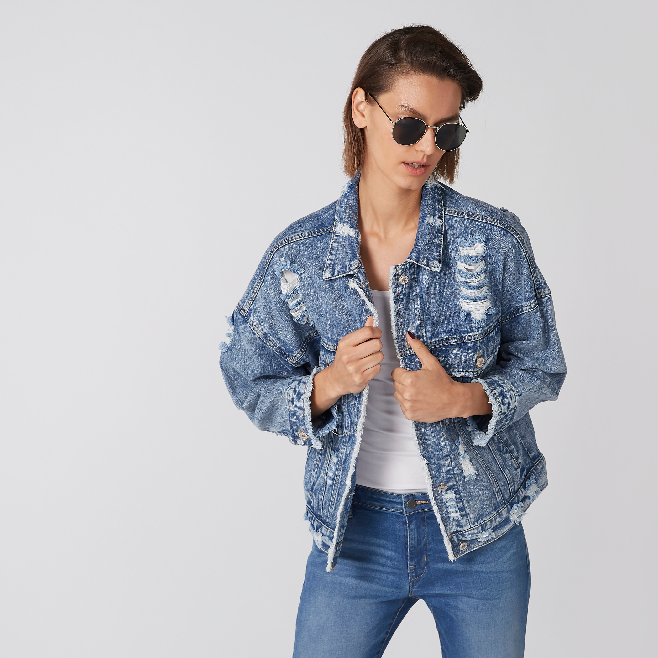 Long destroyed hot sale denim jacket