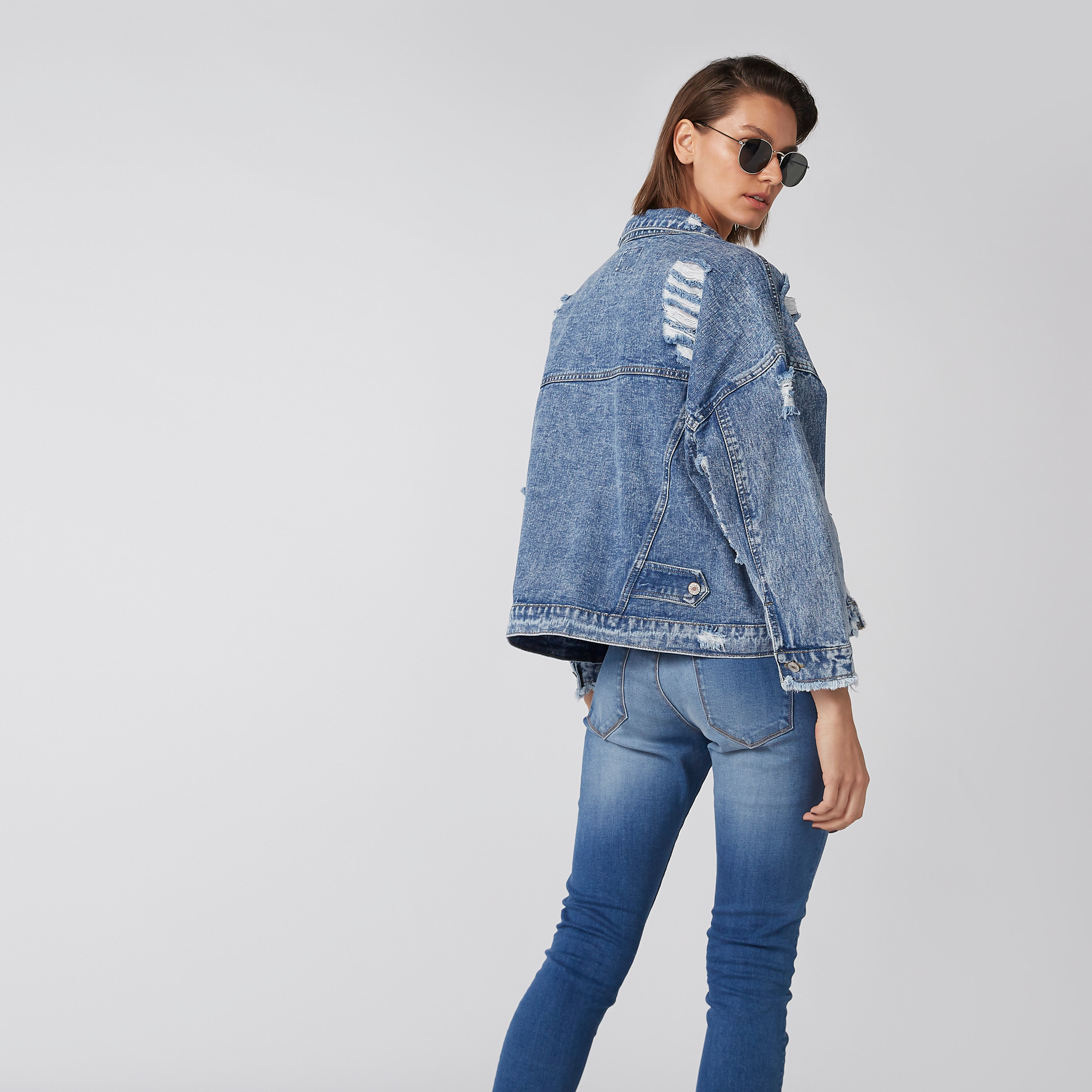 Long destroyed hot sale denim jacket