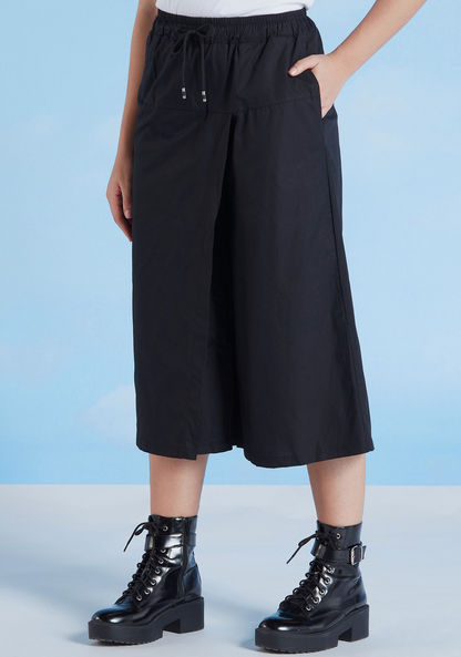 Solid Mid-Rise Palazzos with Elasticated Waistband and Drawstring Closure