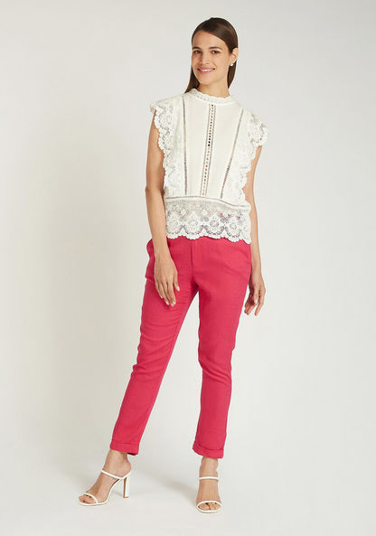 Lace Detail Sleeveless Top with High Neck
