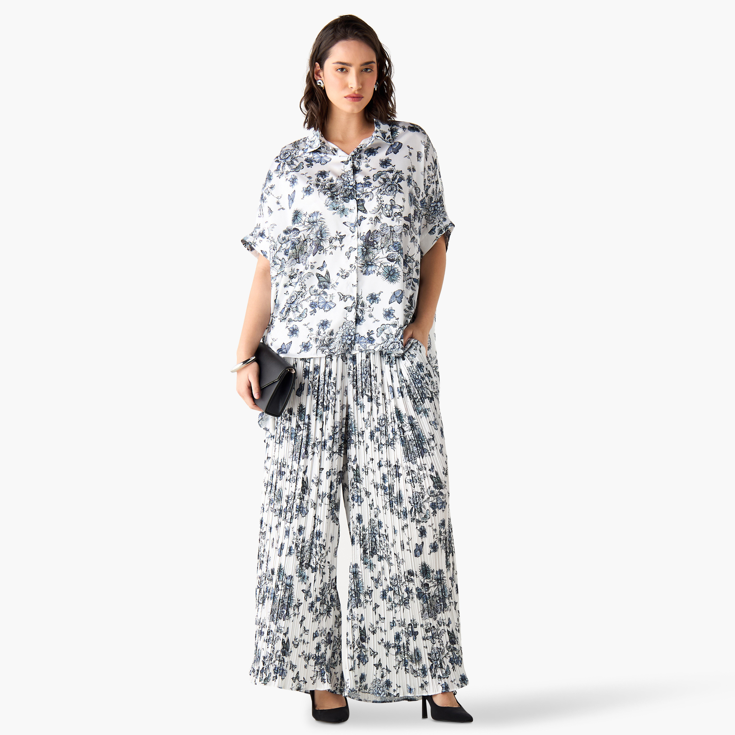 بنطلون واسع الساقين متوسط الارتفاع بجيوب وطبعات من تو إكستريمز-women-clothing-trousers-image-2