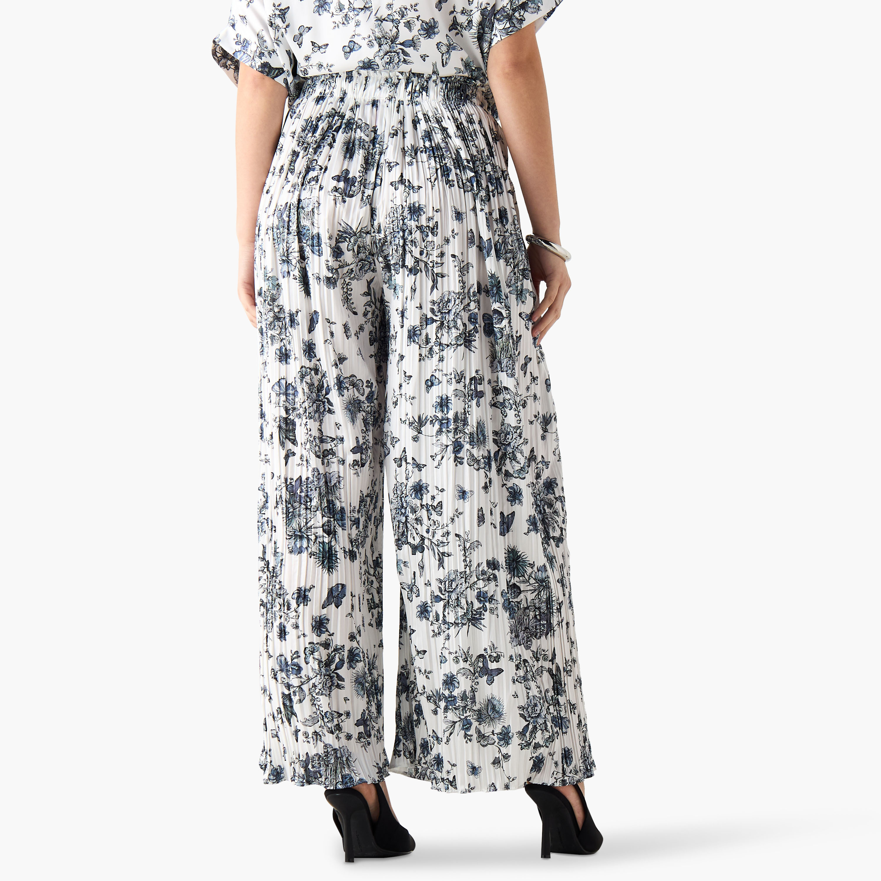 بنطلون واسع الساقين متوسط الارتفاع بجيوب وطبعات من تو إكستريمز-women-clothing-trousers-image-3