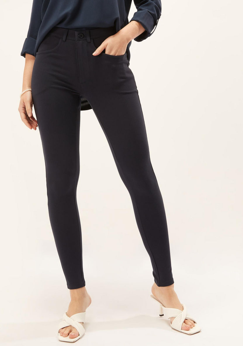 Buy Full Length Solid Treggings with Pocket Detail and Belt Loops