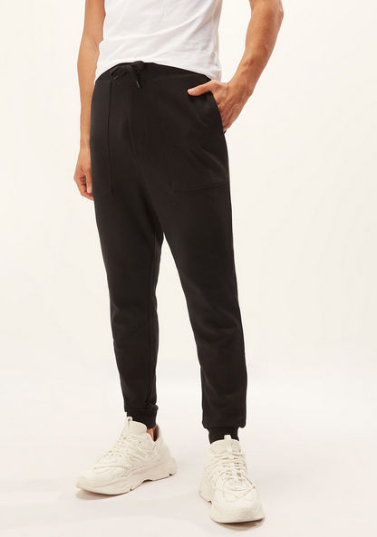 Full Length Solid Jog Pants with Pocket Detail and Drawstring-Joggers-image-0