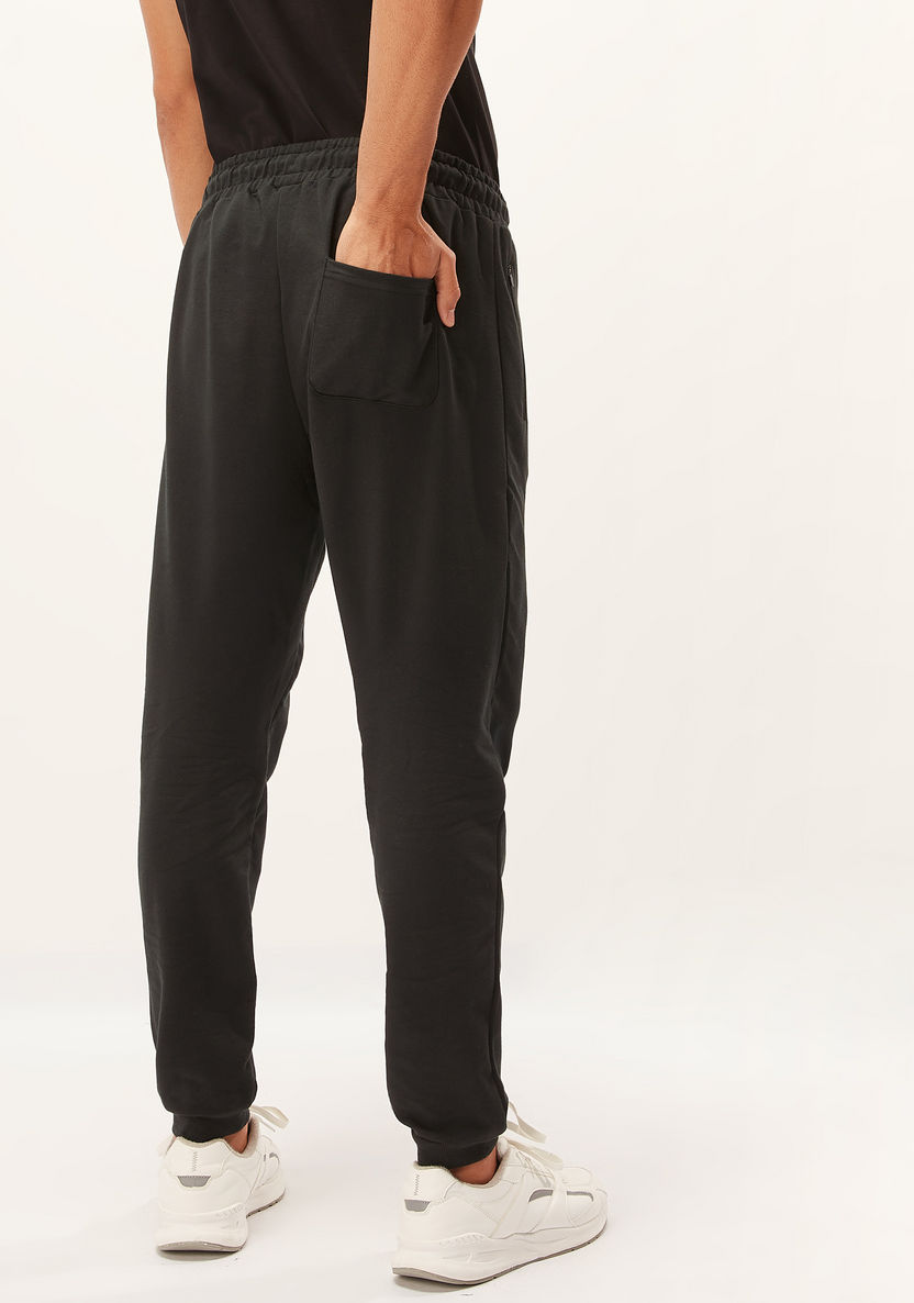 Full Length Solid Jog Pants with Pocket Detail and Drawstring-Bottoms-image-3