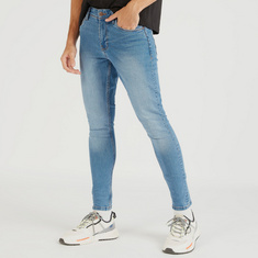 Solid Carrot Fit Jeans with Pockets and Button Closure