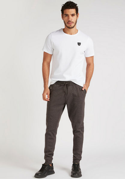 Iconic Solid Joggers with Drawstring Closure and Pockets