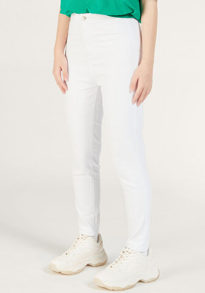 Solid Mid-Rise Jeans with Button Closure