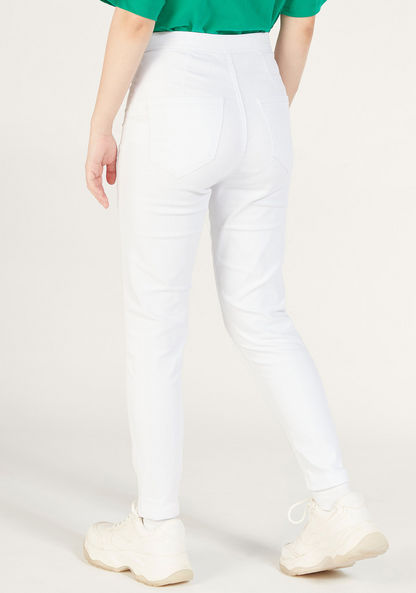 Solid Mid-Rise Jeans with Button Closure