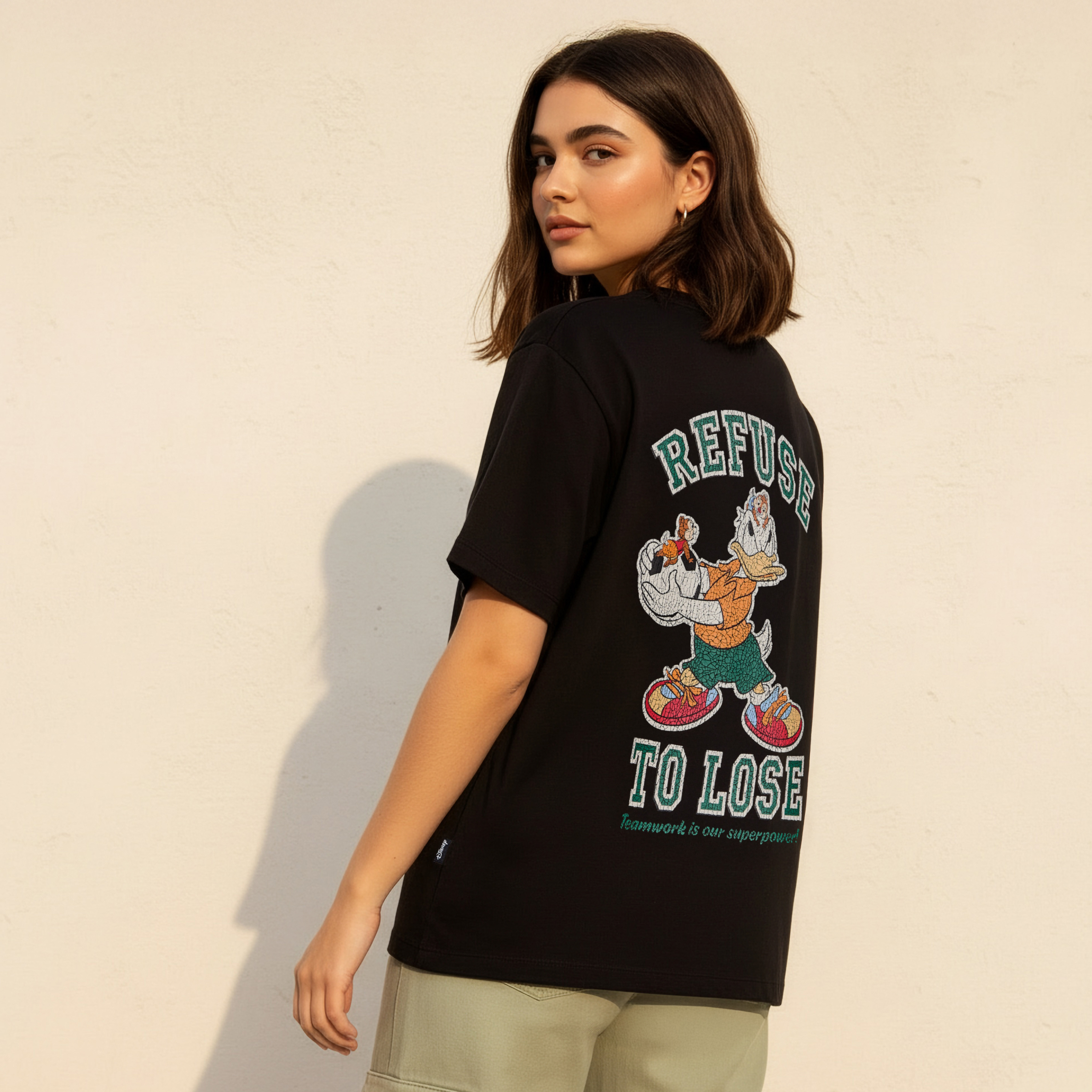 تيشيرت بطبعات دونالد داك-women-clothing-tshirts-image-4