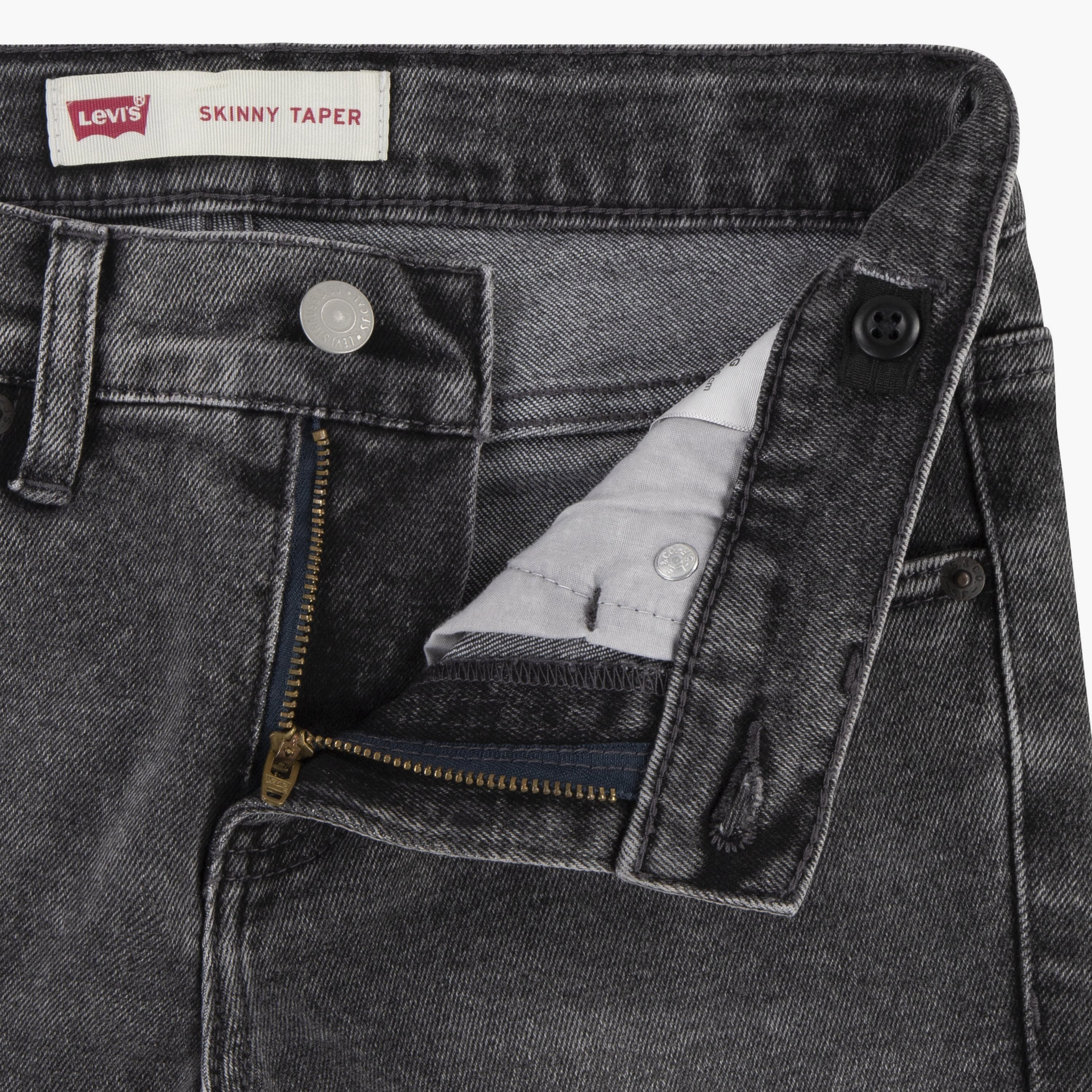 The perfect addition to your toddler boy's casual wardrobe. Designed with meticulous attention to detail, these jeans offer a sleek and stylish look. The button closures not only add a touch of sophistication but also ensure a secure fit. Made with utmost comfort in mind, these jeans are gentle on your little one's delicate skin. The adjustable waist feature allows for a customized fit, ensuring maximum comfort throughout the day. Upgrade your toddler's style game with these trendy and comfortable jeans that are sure to make a statement.-boys-clothing-bottoms-jeans-image-1