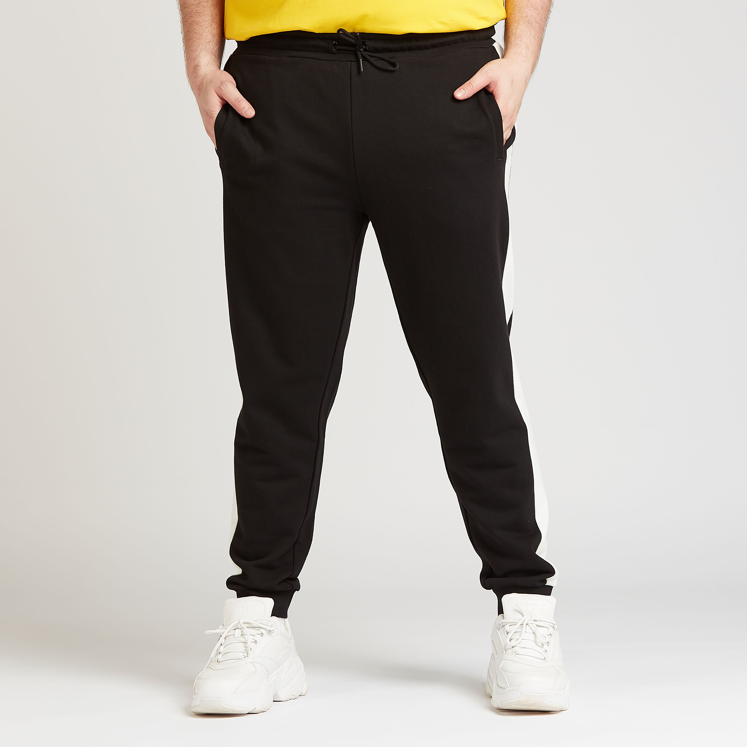 Buy Sustainable Solid Mid Rise Joggers with Pocket Detail and