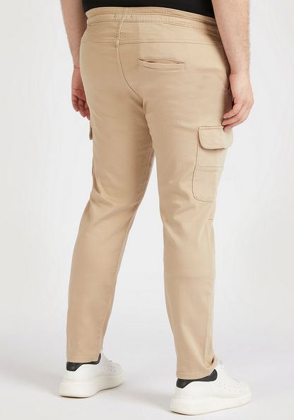 Solid Mid-Rise Cargo Pants with Drawstring Closure and Pockets