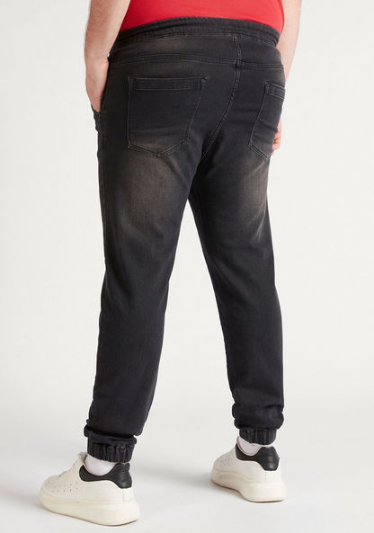 Solid Mid-Rise Denim Joggers with Pockets and Button Closure