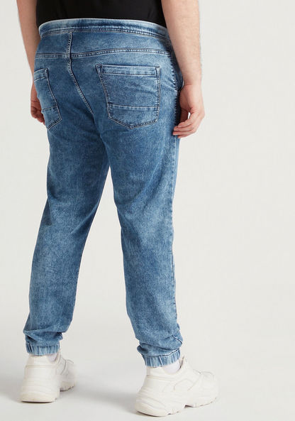 Solid Mid-Rise Denim Joggers with Pockets and Button Closure