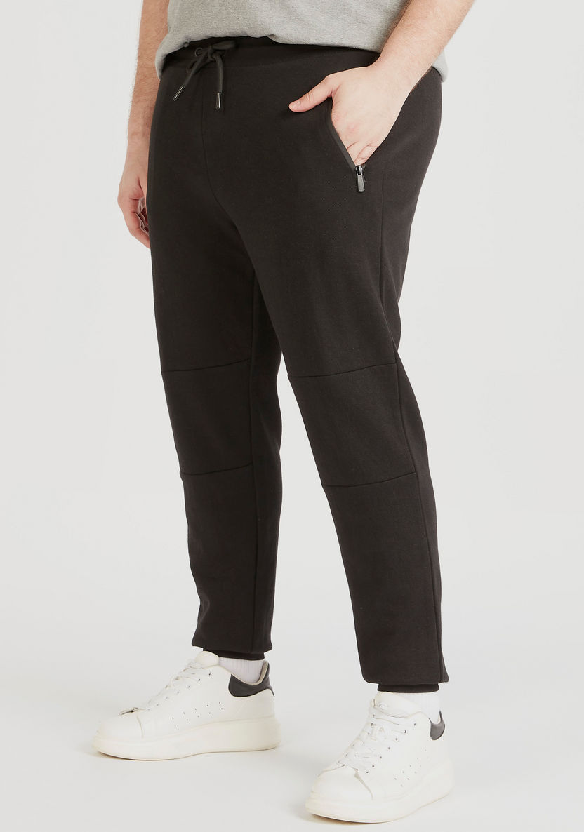 Solid Joggers with Drawstring Closure and Zip Pockets-Joggers-image-0