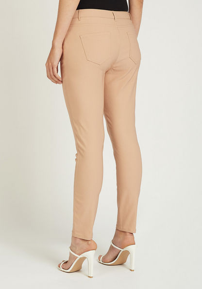 Slim Fit Solid Mid-Rise Treggings with Pocket Detail and Belt Loops