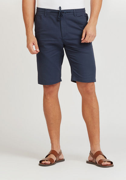Slim Fit Solid Mid-Rise Shorts with Pocket Detail and Drawstring
