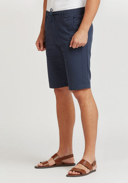 Slim Fit Solid Mid-Rise Shorts with Pocket Detail and Drawstring